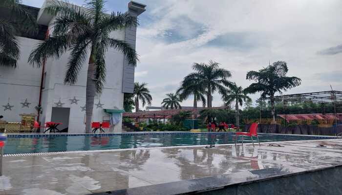 Swimming Pool - TULIP GARDEN HOTEL AND RESORT Rooma